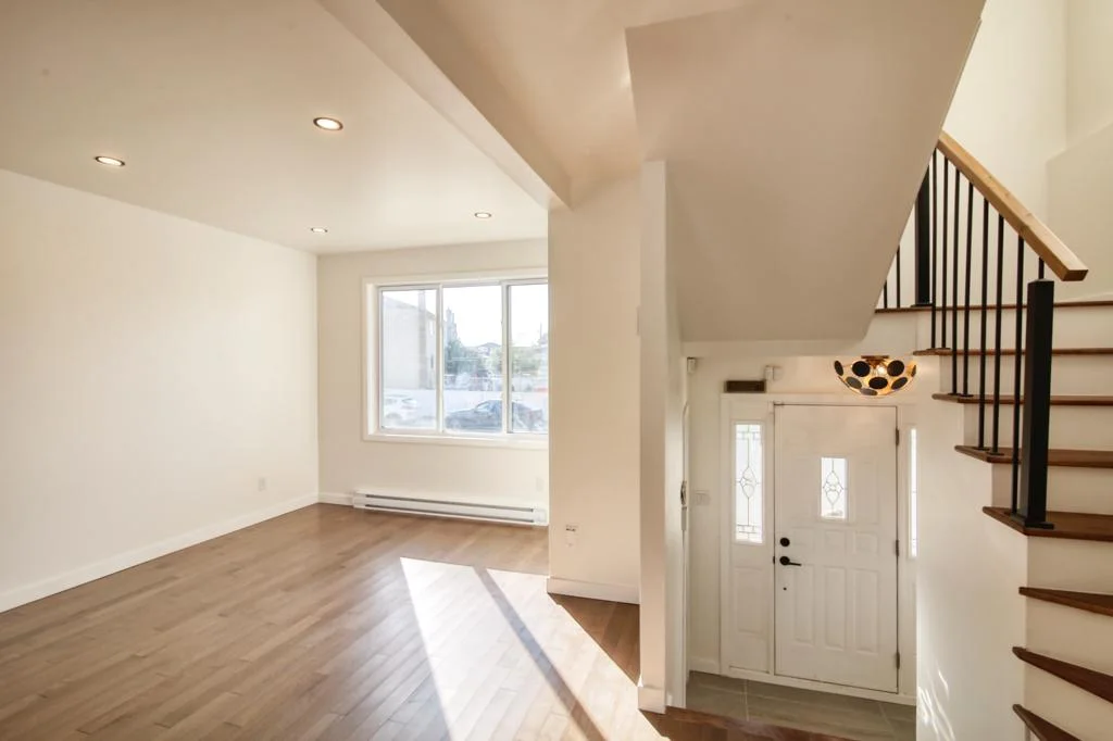View from the front door — living room and staircase